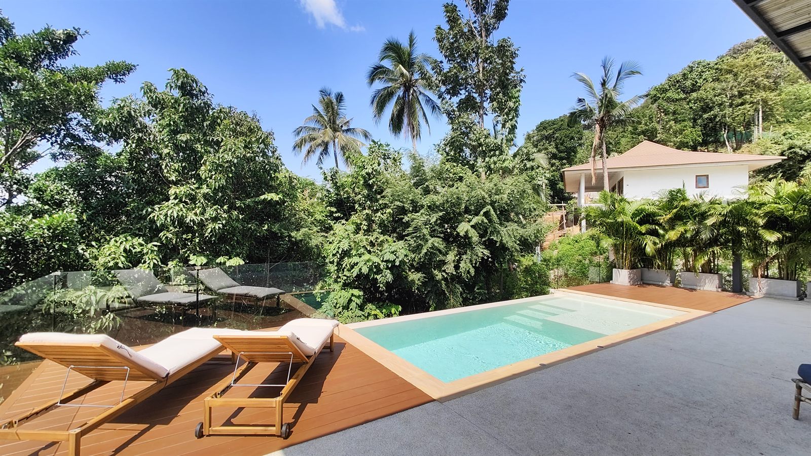 Villa Azhara — rooftop lounge with bay view