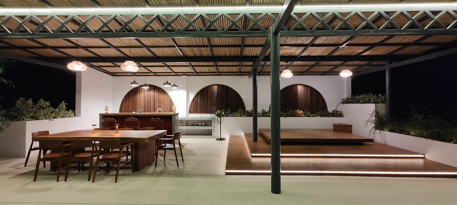 Villa Azhara — rooftop lounge at night