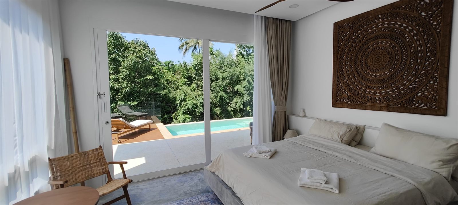 Villa Azhara — bedroom with pool view