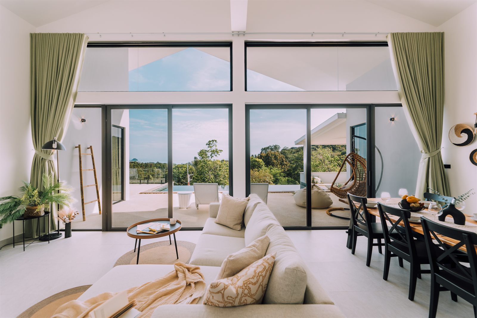 Breath of Paradise — living room opening to the deck