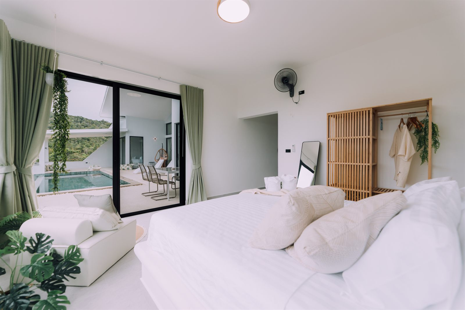 Breath of Paradise — bedroom with pool view