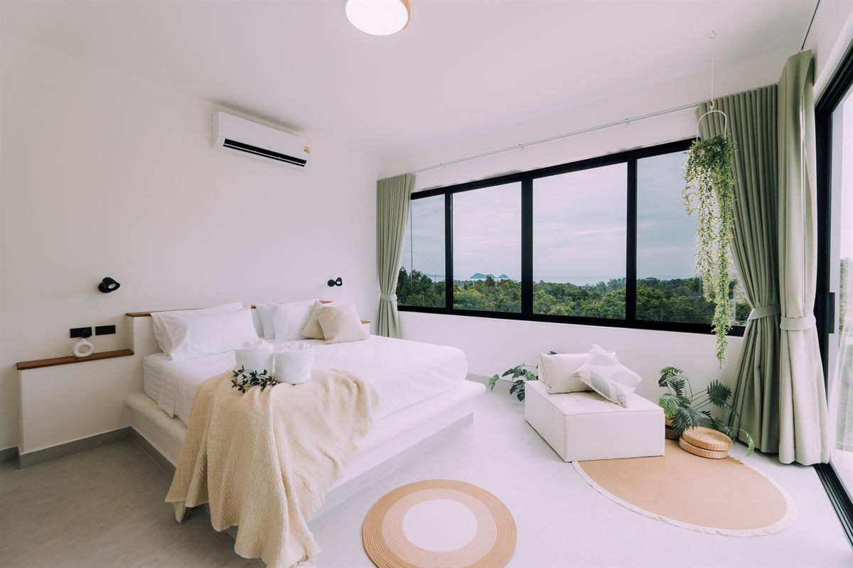 Breath of Paradise — bedroom with garden view