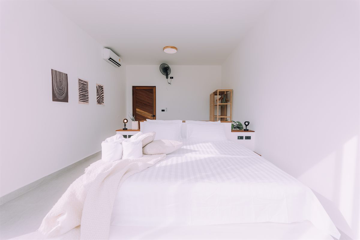 Breath of Paradise — bedroom with terrace view